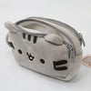 A gray cat-faced plush pencil case with a zipper closure.