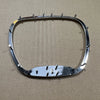 Silver steering wheel cover with spikes and emblem