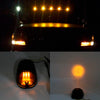 A close-up view of amber and white LED cab roof marker lights installed on a vehicle.
