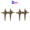 A pair of brass Y2K star waist tightener clips for jeans.