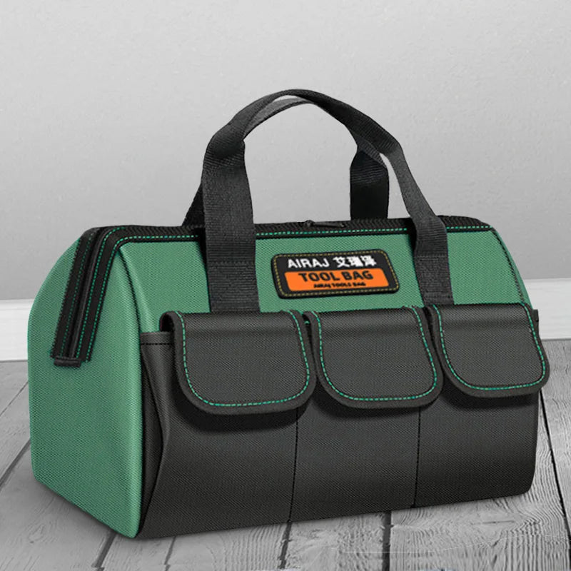 A green and black durable waterproof tool storage bag with multiple external pockets.