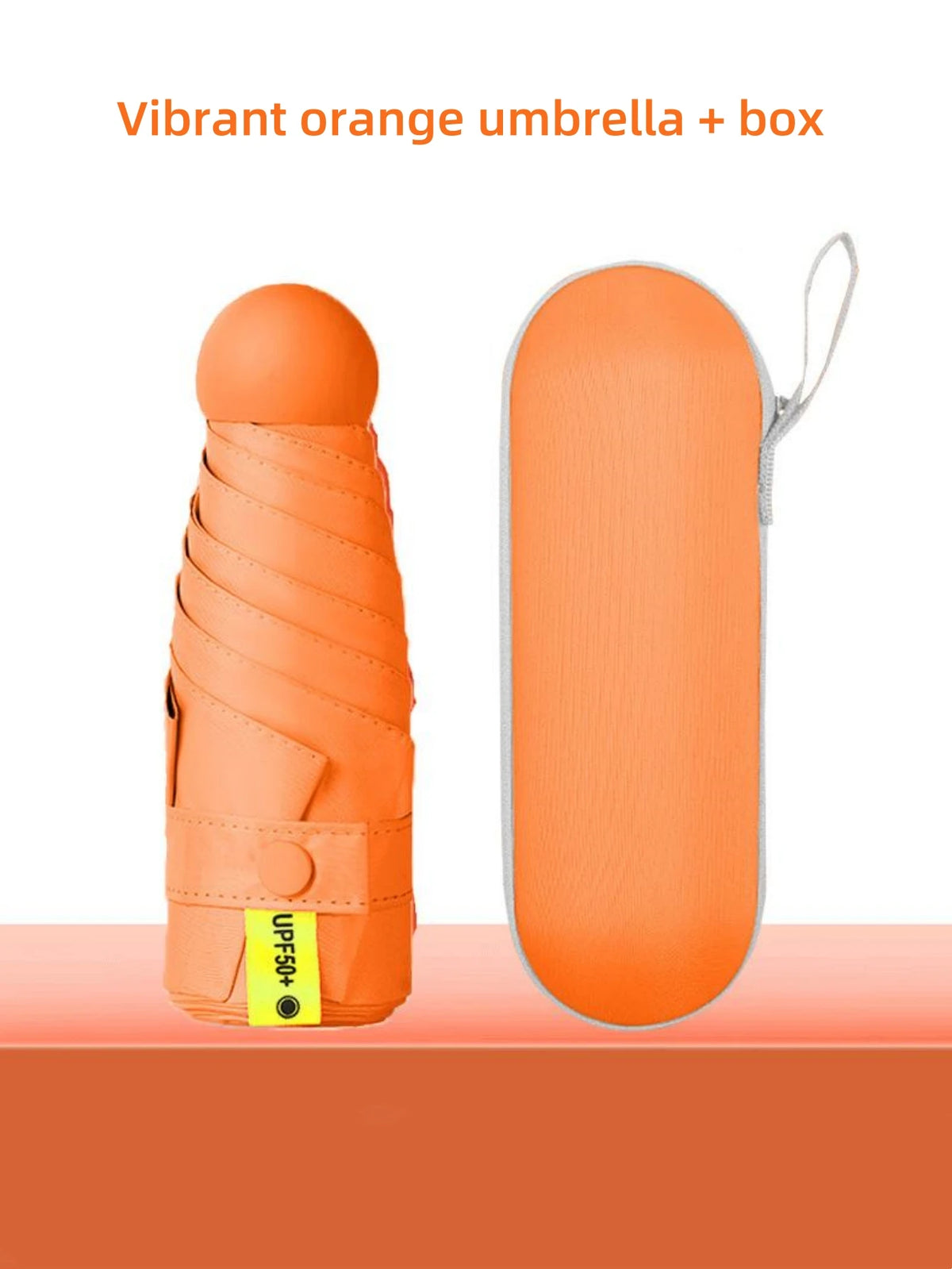 Vibrant orange umbrella and box set featuring a compact folding umbrella.