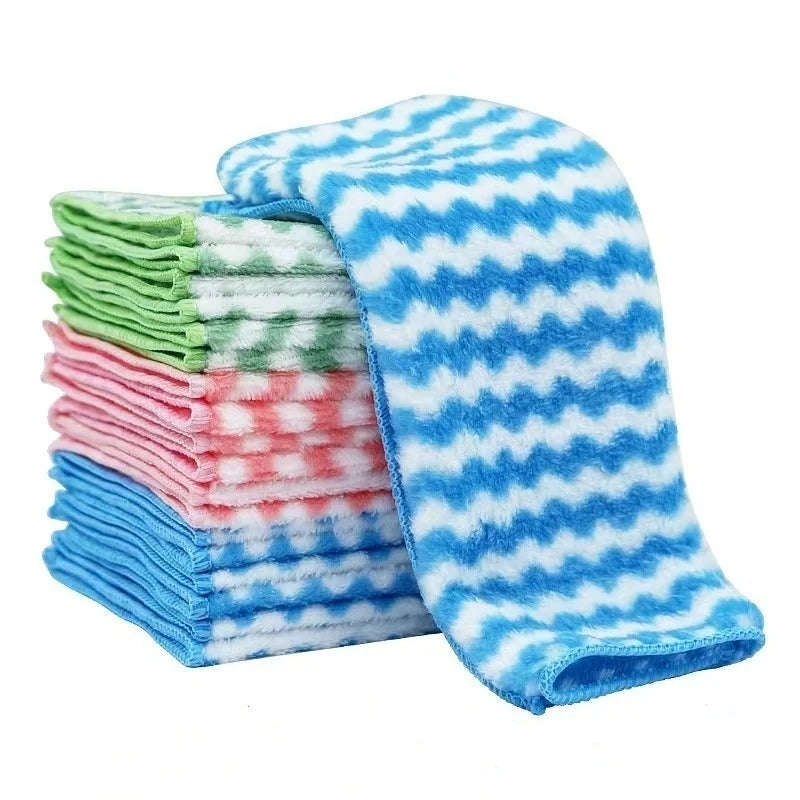 A stack of blue and white patterned microfiber kitchen cleaning cloths.