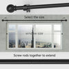 A black iron curtain rod with ball finials is shown being selected and screwed together to extend.