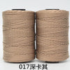 Two spools of beige 3-ply polyester knitting yarn for crochet and hand crafts