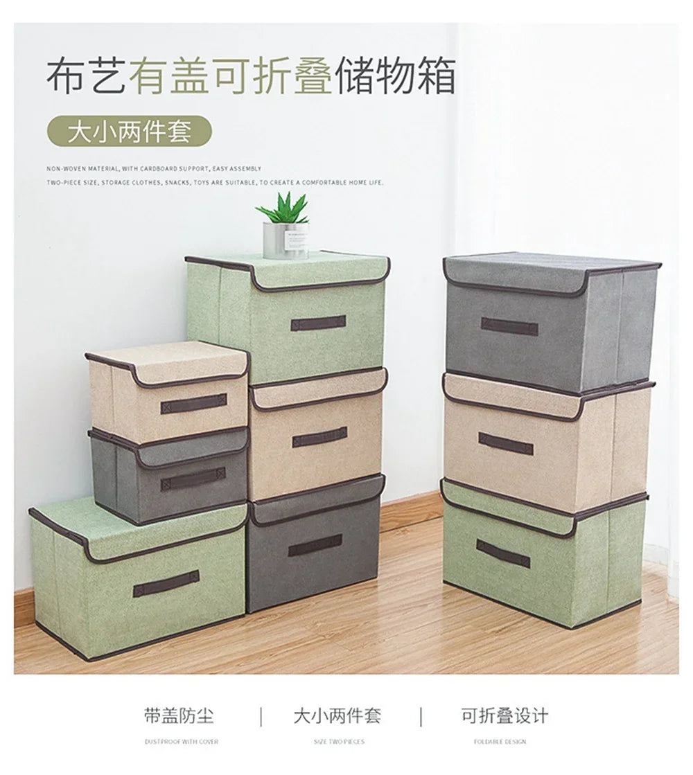 A set of light green and gray fabric storage boxes stacked and arranged for closet or drawer organization.