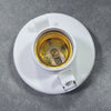 A white light bulb holder with a glass socket and screw cap, set against a gray background.