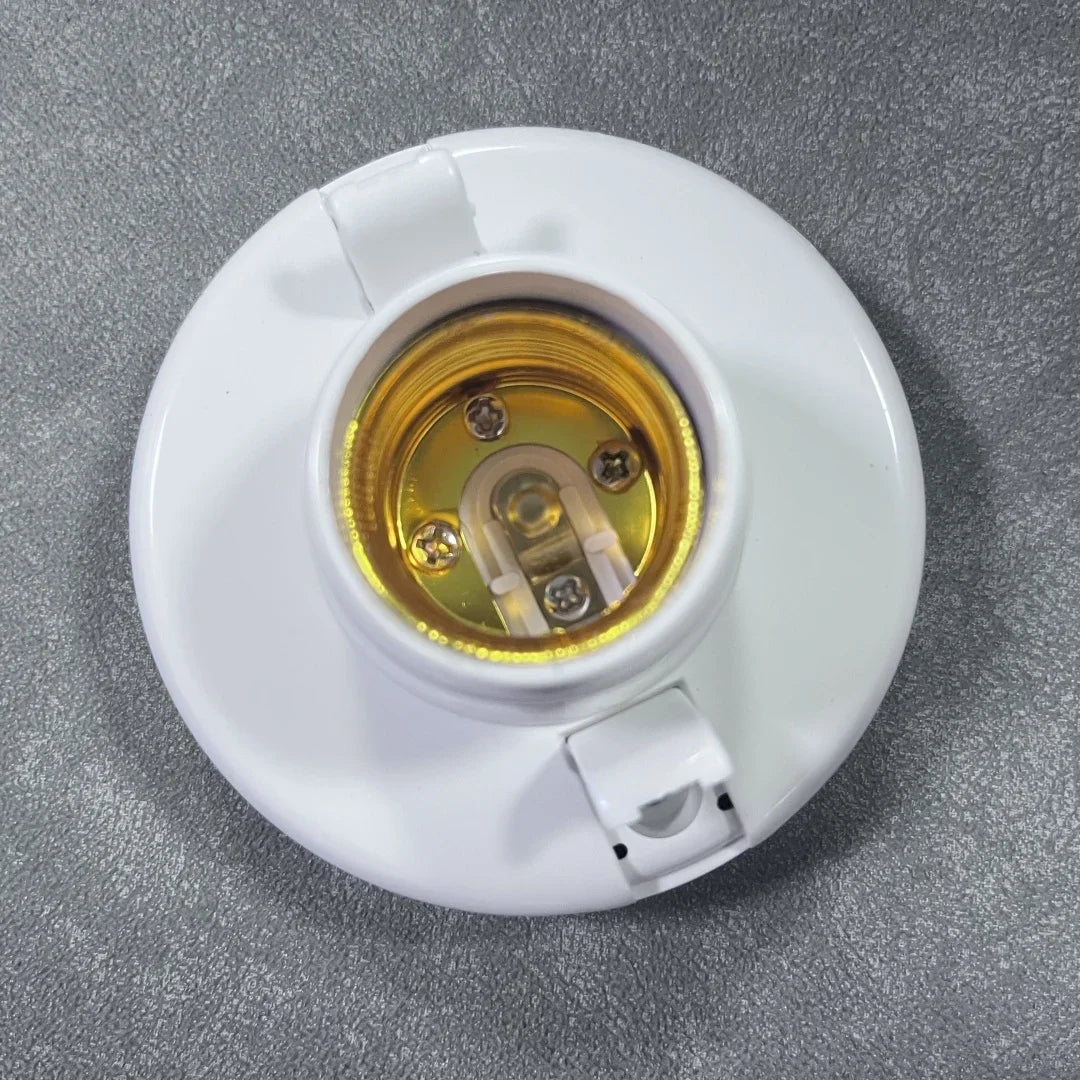 A white light bulb holder with a glass socket and screw cap, set against a gray background.
