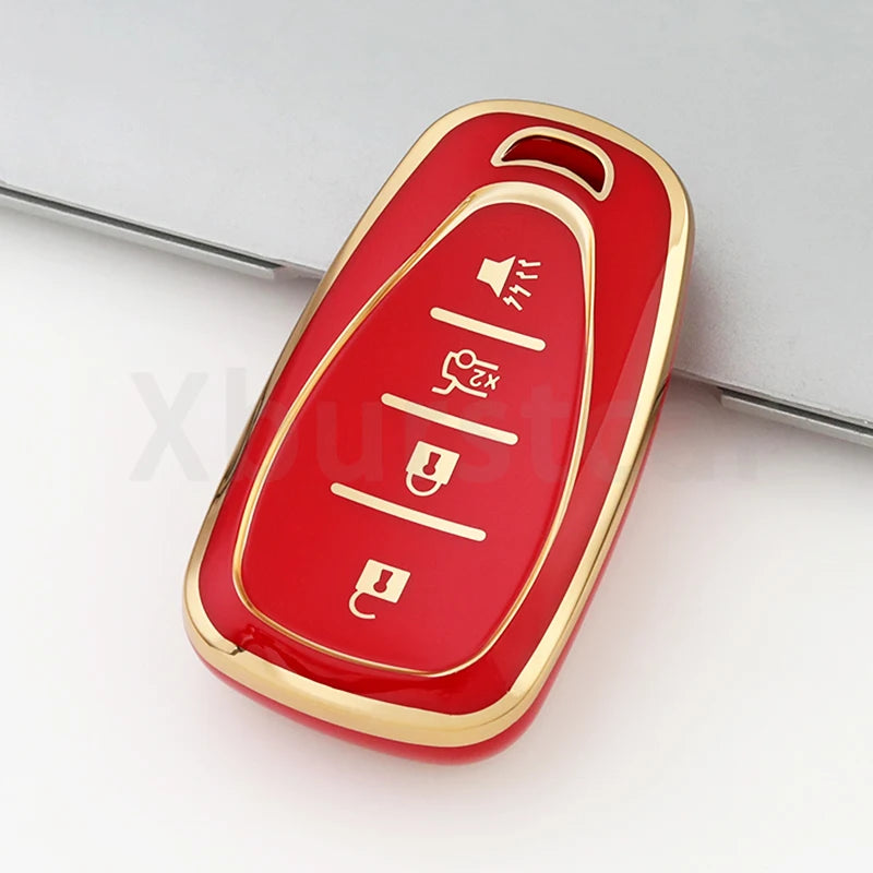 A red and gold durable TPU key fob cover for a Chevrolet vehicle.