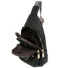 Black PU leather crossbody bag with a patterned adjustable strap shown from the side.