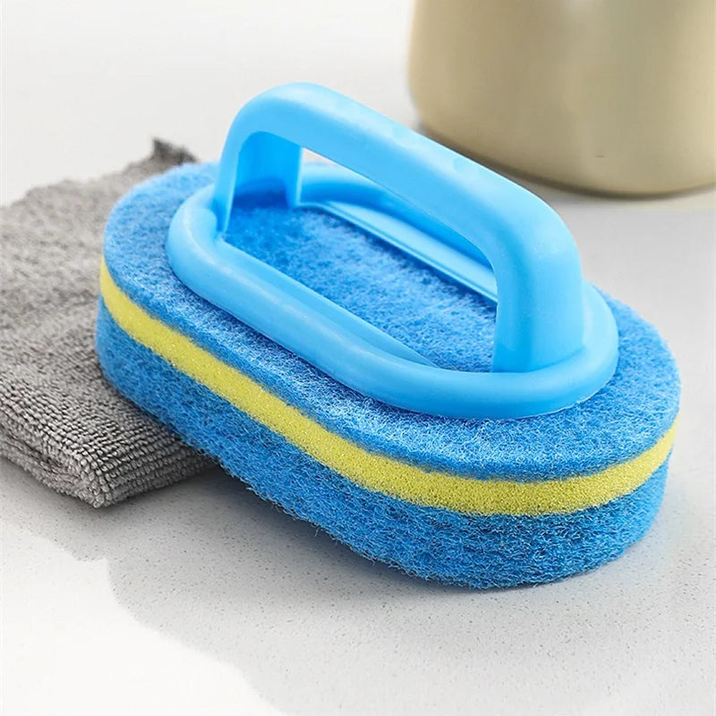 Blue and yellow sponge cleaning brush with a blue handle resting on a gray cloth.