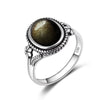 Vintage Sterling Silver Obsidian Ring with Sun and Flower Motif