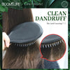 A black boar bristle hair brush is shown being used on dark brown hair, with a close-up view of the bristles.