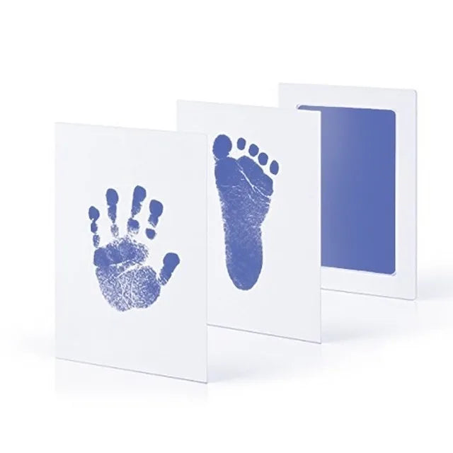 A set of three white cards showing a blue handprint and a blue footprint impression.