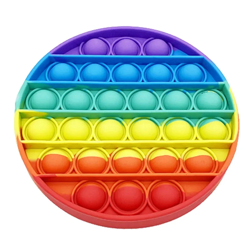 A colorful plastic fidget toy with multiple colored bubbles arranged in a hexagonal grid.