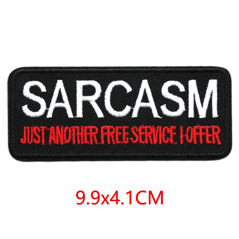 Black embroidered iron-on letter patch with white text saying SARCASM JUST ANOTHER FREE SERVICE I OFFER