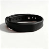 A black silicone wristband with a buckle and several holes for access control.