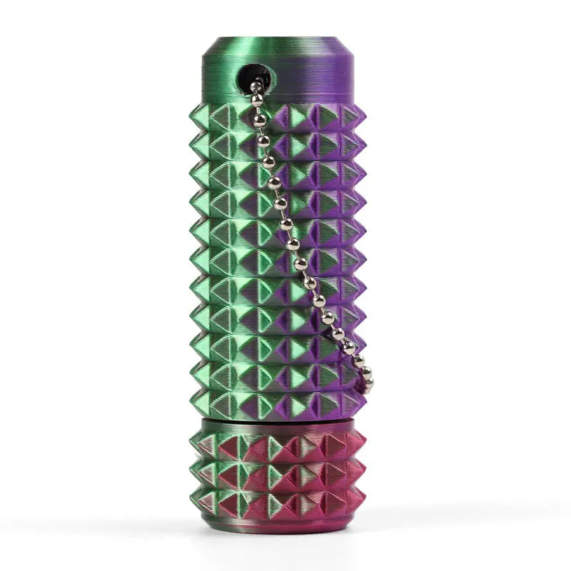 A metallic green and purple spiky fidget keychain with a silver chain.