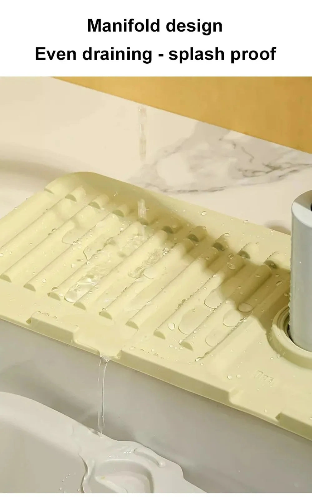 A silicone faucet draining mat with a manifold design is shown dripping water into a sink.