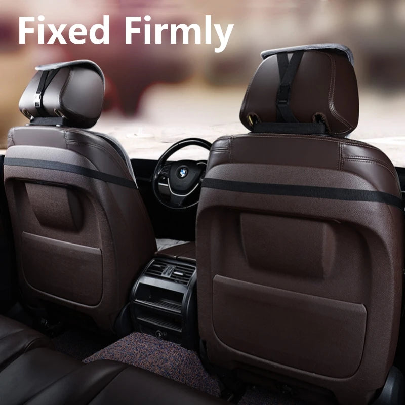 Two brown car seats with fixed firmly backrest support visible inside a vehicle.