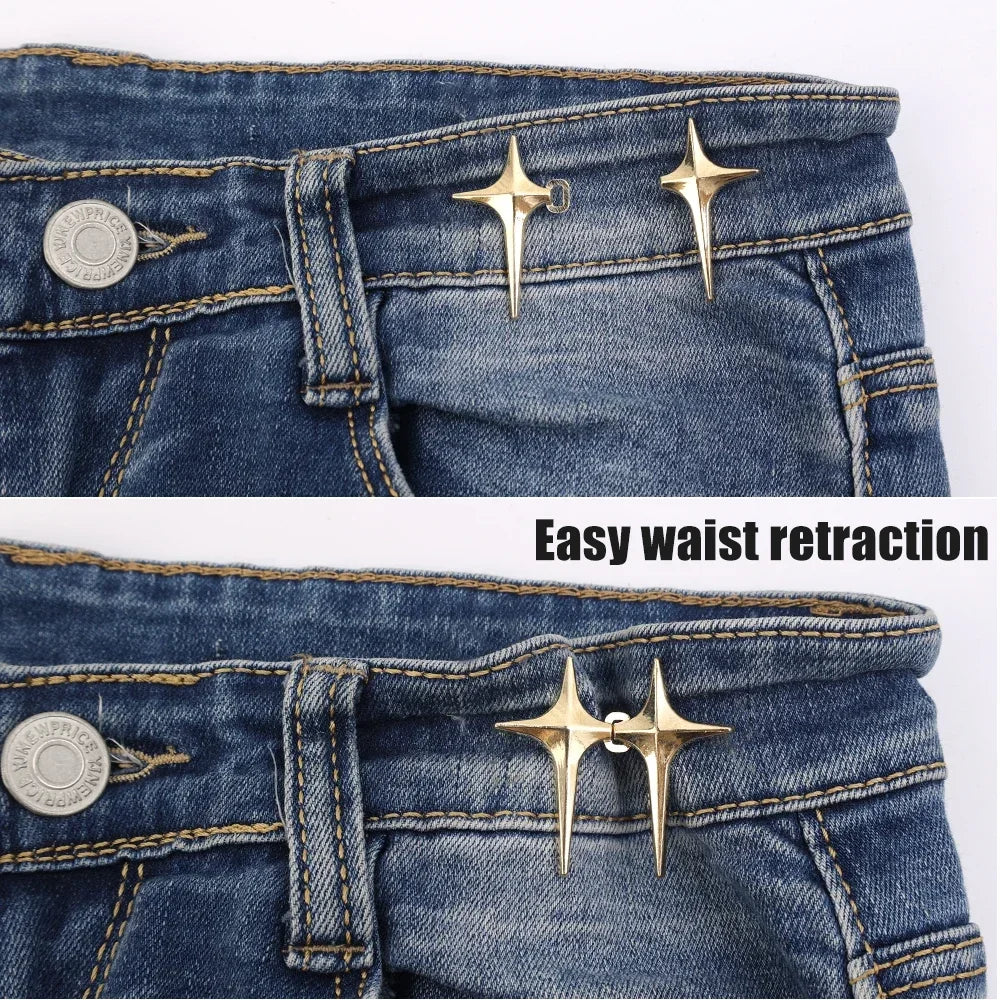 Close-up of dark wash denim jeans showing gold Y2K star waist retraction clips on the waistband.