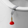 A silver and red hands-free toilet lid lifter attached to a white ceramic toilet rim.