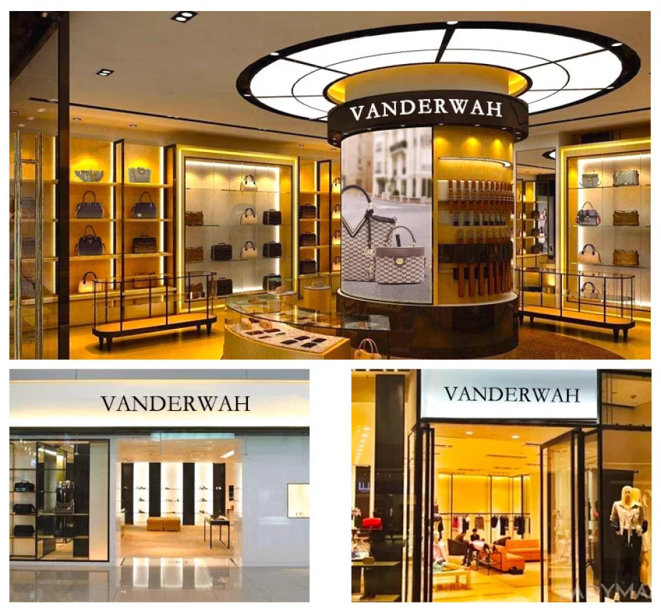 A display featuring an elegant large-capacity leather handbag and a matching coin purse in a retail setting.