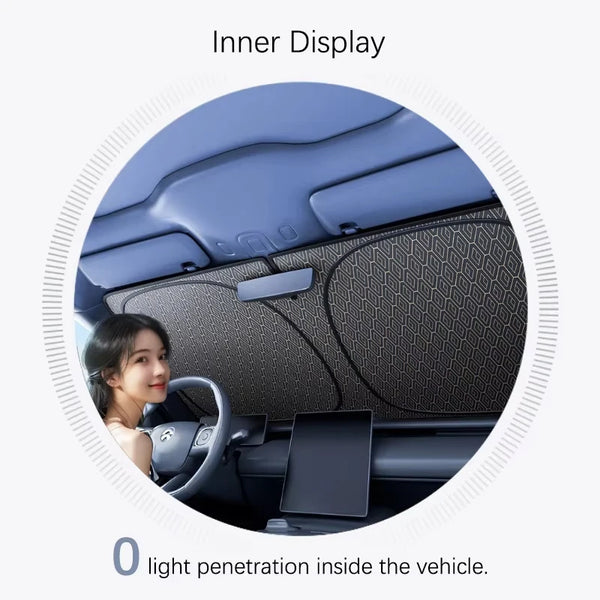 Inner display showing a view of the car interior with a dark textured surface and a steering wheel.
