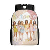 A pink and white canvas daypack backpack featuring a graphic of seven women.