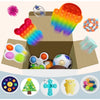 A collection of colorful fidget toys including a rainbow cube, a fidget cube, a Christmas tree, a puzzle, and a yellow animal
