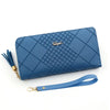 A navy blue quilted PU leather wristlet clutch wallet with a gold chain and strap.
