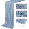 Light blue semi-sheer gauze table runner with a clean edge and soft texture