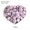 A pile of purple silicone star heart beads for DIY jewelry making