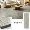 Close-up view of light gray wood grain floor tiles and a sample board labeled HDB-004