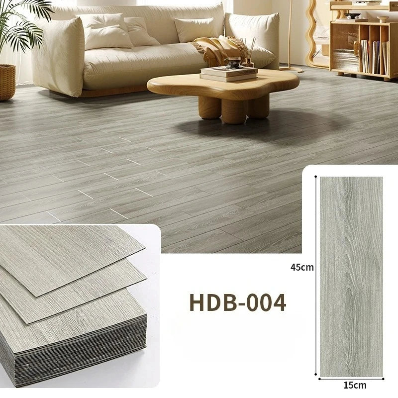 Close-up view of light gray wood grain floor tiles and a sample board labeled HDB-004
