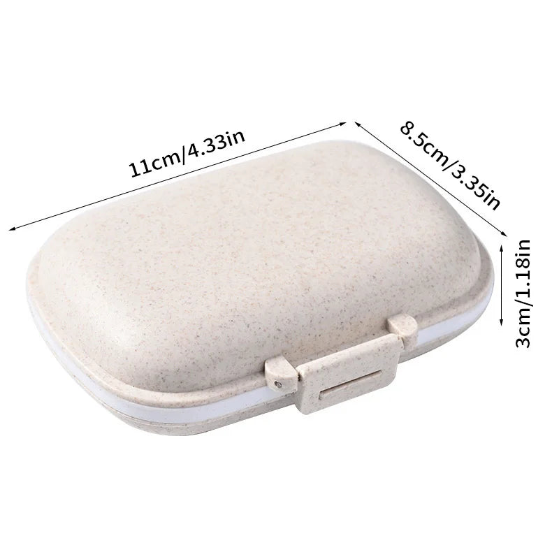 A beige weekly pill organizer with eight compartments shown from above.