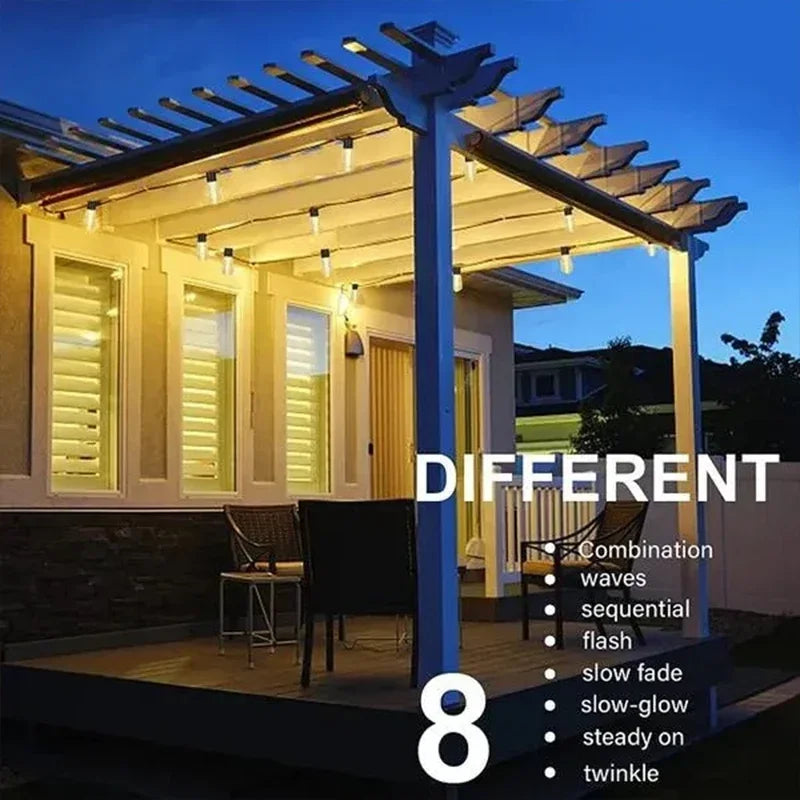 Outdoor string lights illuminating a wooden pergola and house facade at dusk.