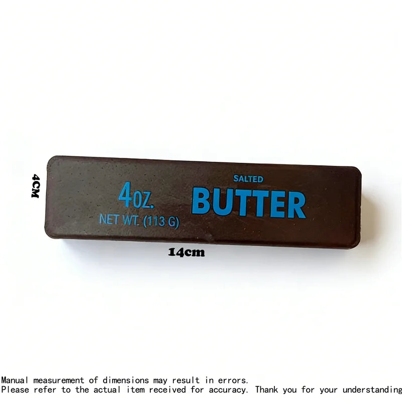 A rectangular dark brown butter block fidget toy labeled salted butter