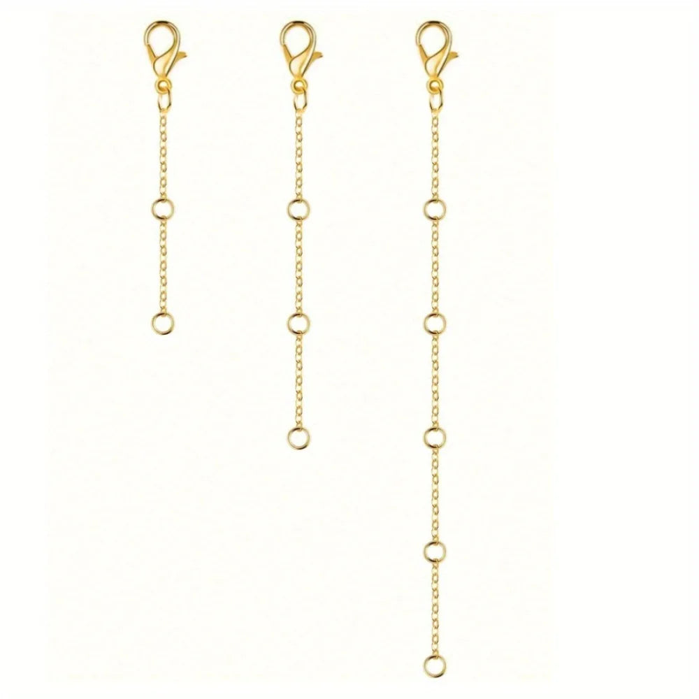 A gold-plated necklace extender chain with a lobster clasp displayed against a white background.