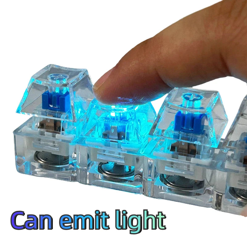 A hand holds several clear plastic LED mechanical keychain fidget toys that emit blue light.
