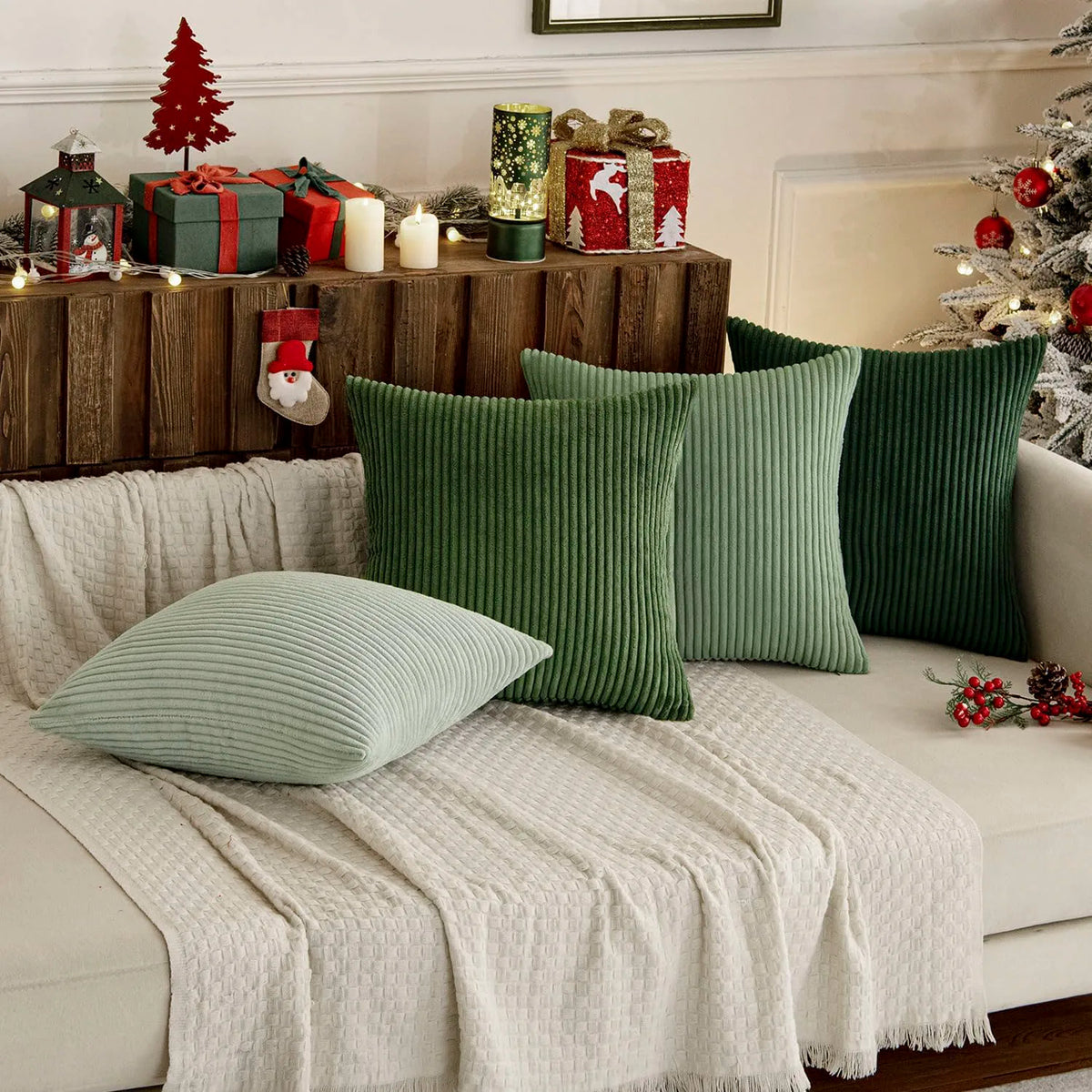 A collection of olive green and white textured throw pillow covers displayed on a sofa with wooden decor.