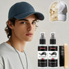 A man models a hat cleaning kit with two spray bottles and a brush against a light background.