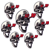 A set of ten embroidered iron-on patches depicting skulls with red tongues.