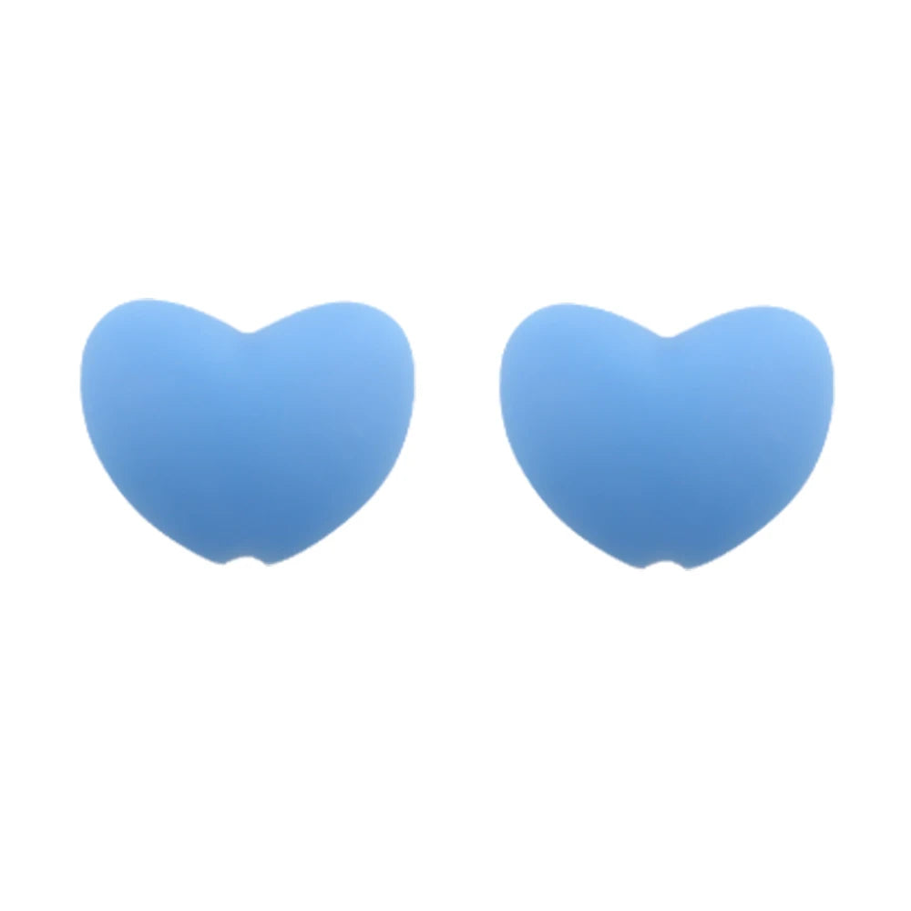 A pair of light blue silicone heart beads for DIY jewelry making