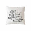 A white throw pillow with black script text that reads You are loved worthy fearless beautiful