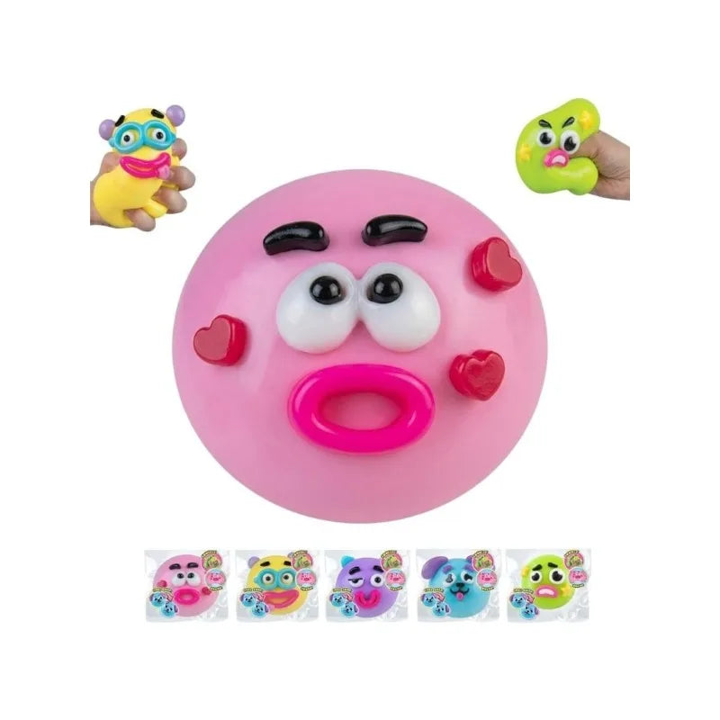 A pink squishy toy with face-changing features, including a yellow and purple character head.