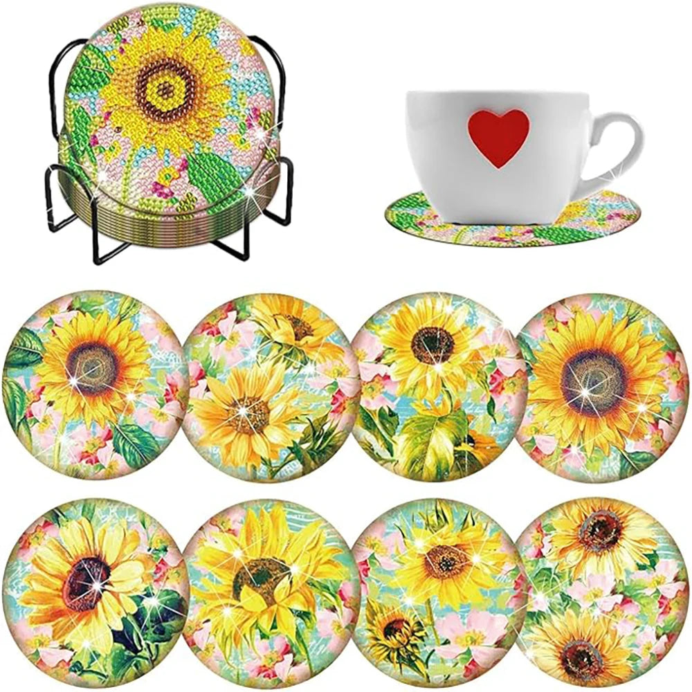 A set of sparkling diamond painting coasters featuring colorful sunflower designs and a holder.