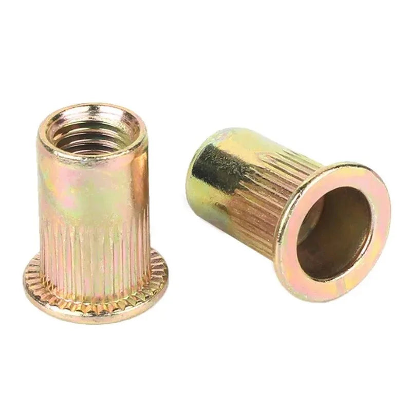 A set of zinc plated rivet nuts and blind threaded inserts for various sizes.