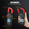 A hand holds a black digital clamp meter with a red handle, showing its size and features.