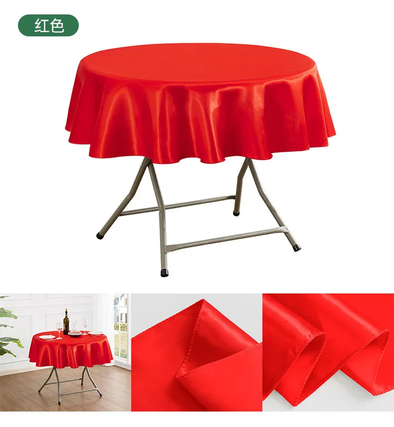 A bright red luxurious round satin tablecloth displayed on a metal stand.